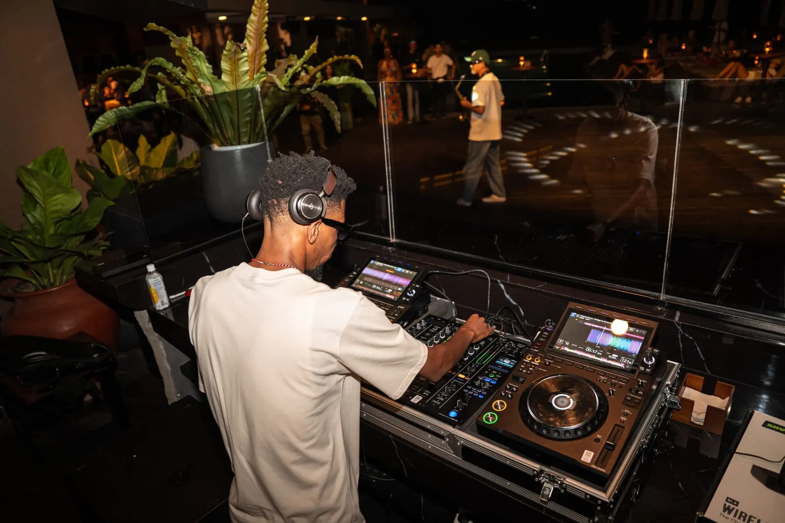 Resident DJ setting the mood at the Reload Social evening event in Canggu